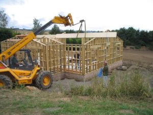 picture of lifting the beams - click for larger image. Opens in new tab