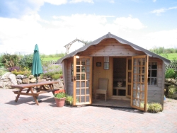 picture of summer house and sauna - click for larger image. Opens in new tab